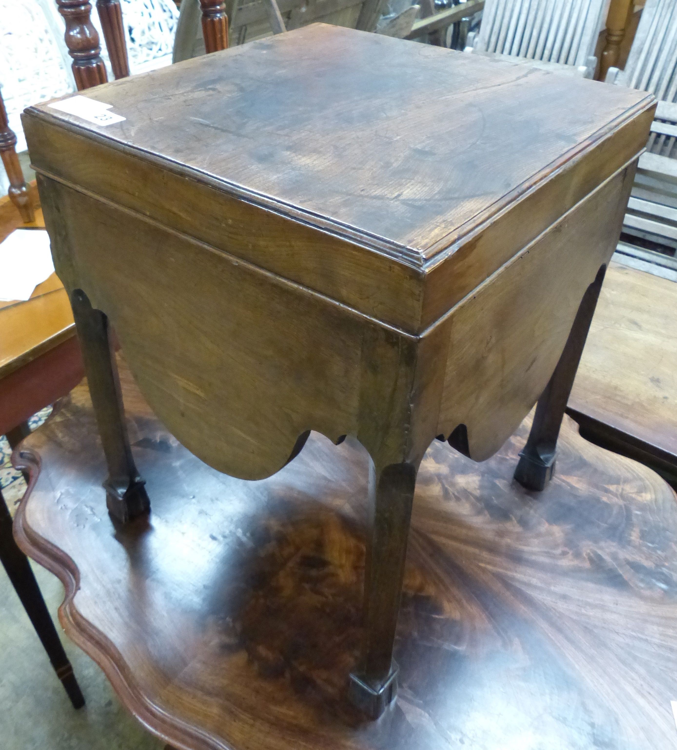 A George III mahogany commode, with shaped apron, on squared legs, W.38cm D.38cm H.49cm (altered)